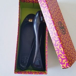 Used Tory Burch water proof/silicone flats size 7